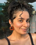 gold plated Carved Carnelian floral earrings with a carnelian flower drop handmade by A Creator's Studio