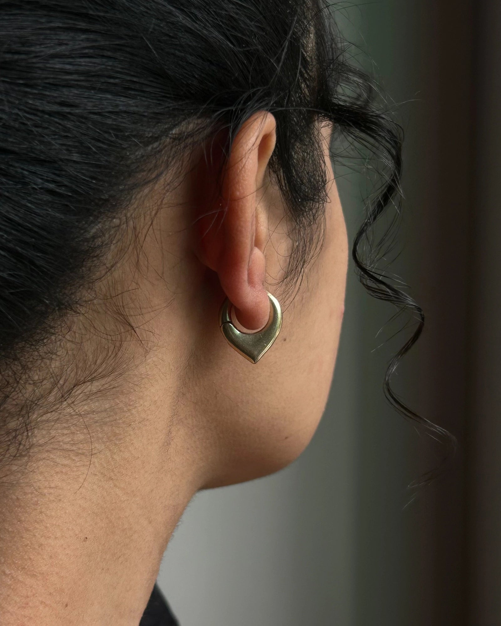 Brass dagger hoop earrings handmade by A Creator's Studio