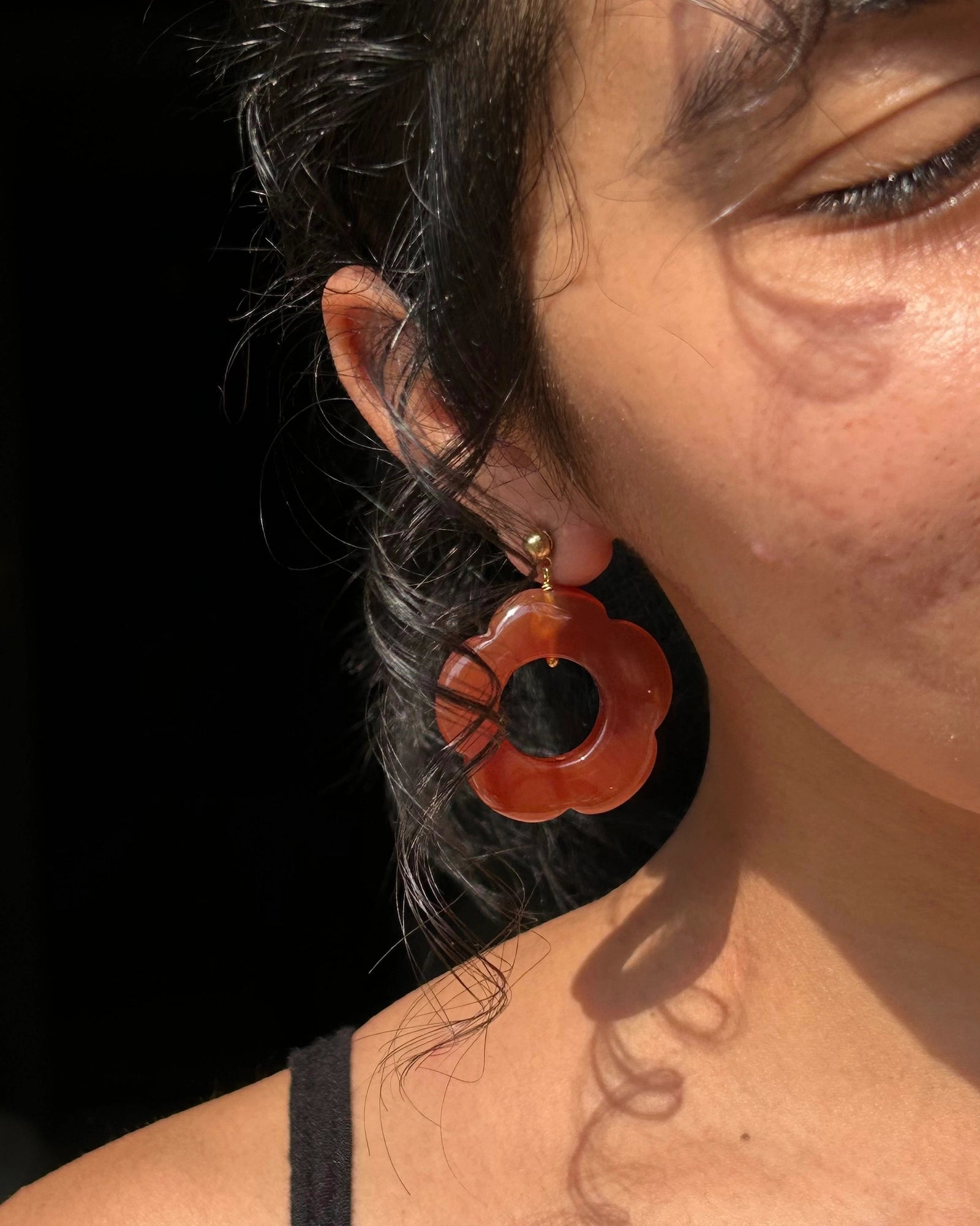 gold plated Carved Carnelian floral earrings with a carnelian flower drop handmade by A Creator's Studio