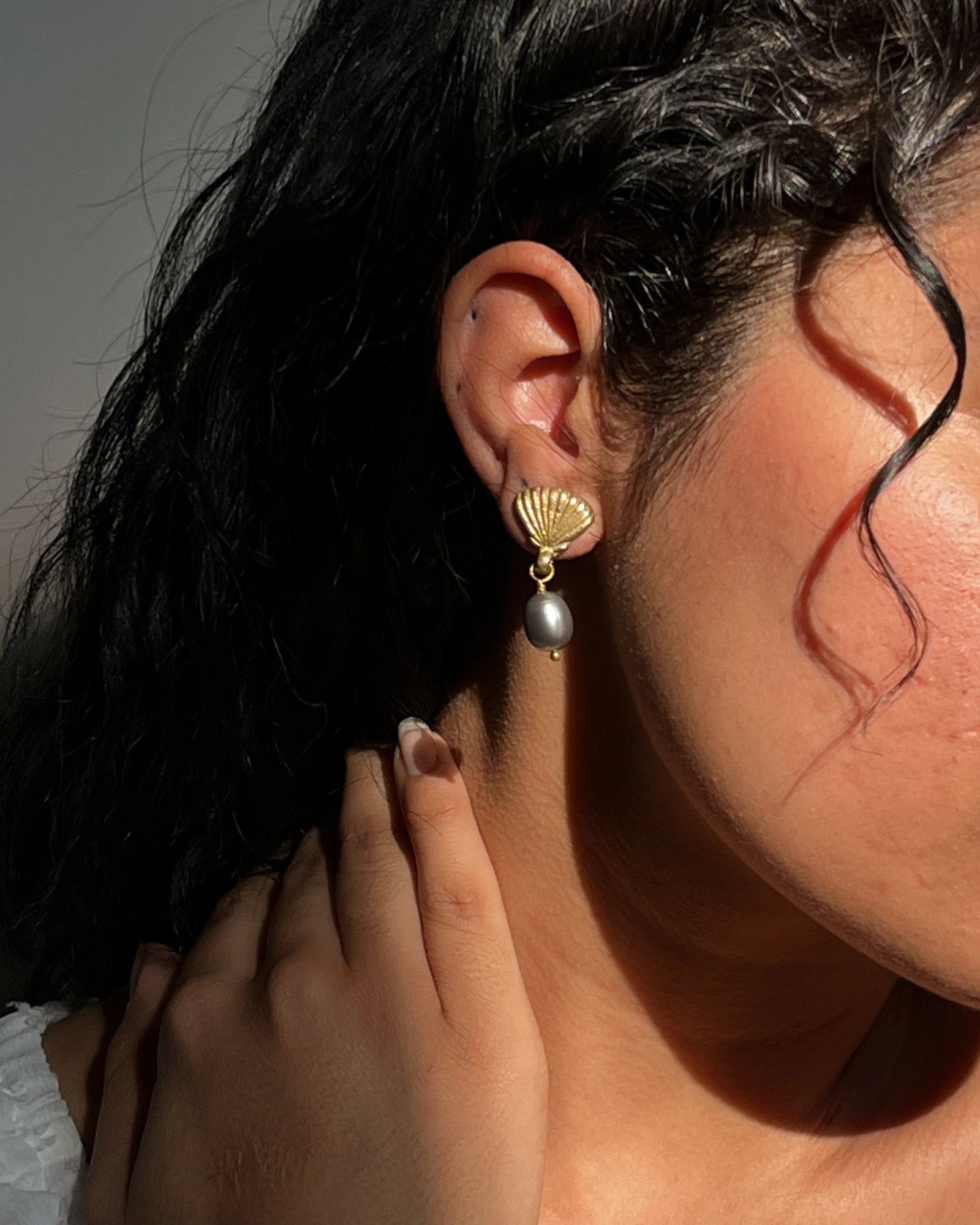 Gold Plated Seashell Pearl earrings with a grey fresh water pearl drop handmade by A Creator's Studio