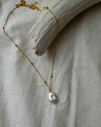 18k Gold dipped freshwater pearl necklace with a single freshwater pearl pendant  handmade by A Creator's Studio