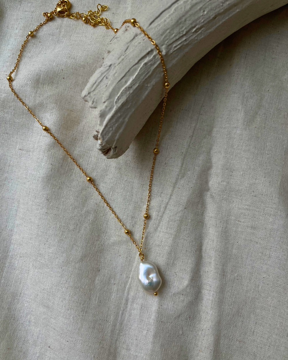 18k Gold dipped freshwater pearl necklace with a single freshwater pearl pendant  handmade by A Creator's Studio
