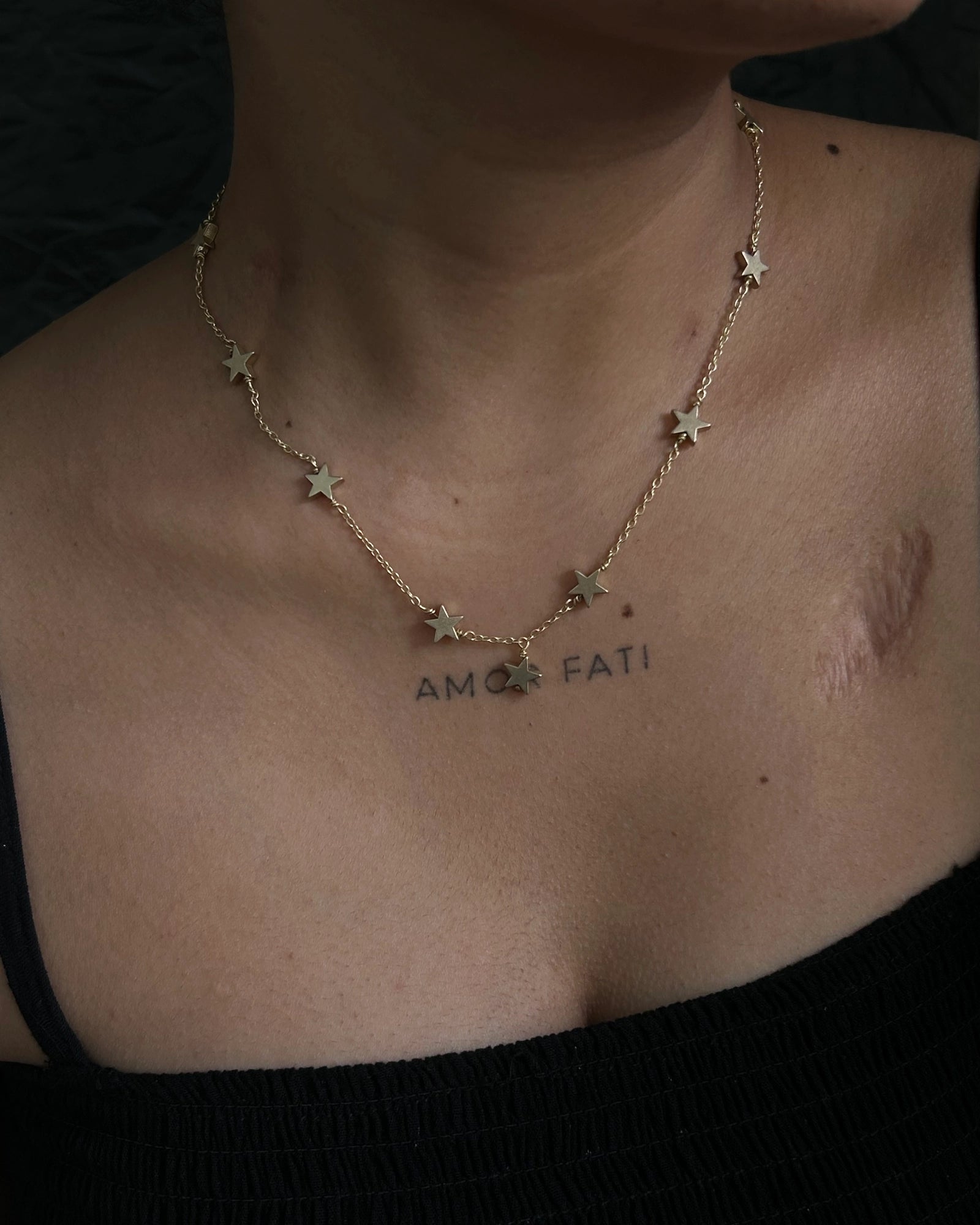 Brass star link choker with stars linked together handmade by A Creator's Studio