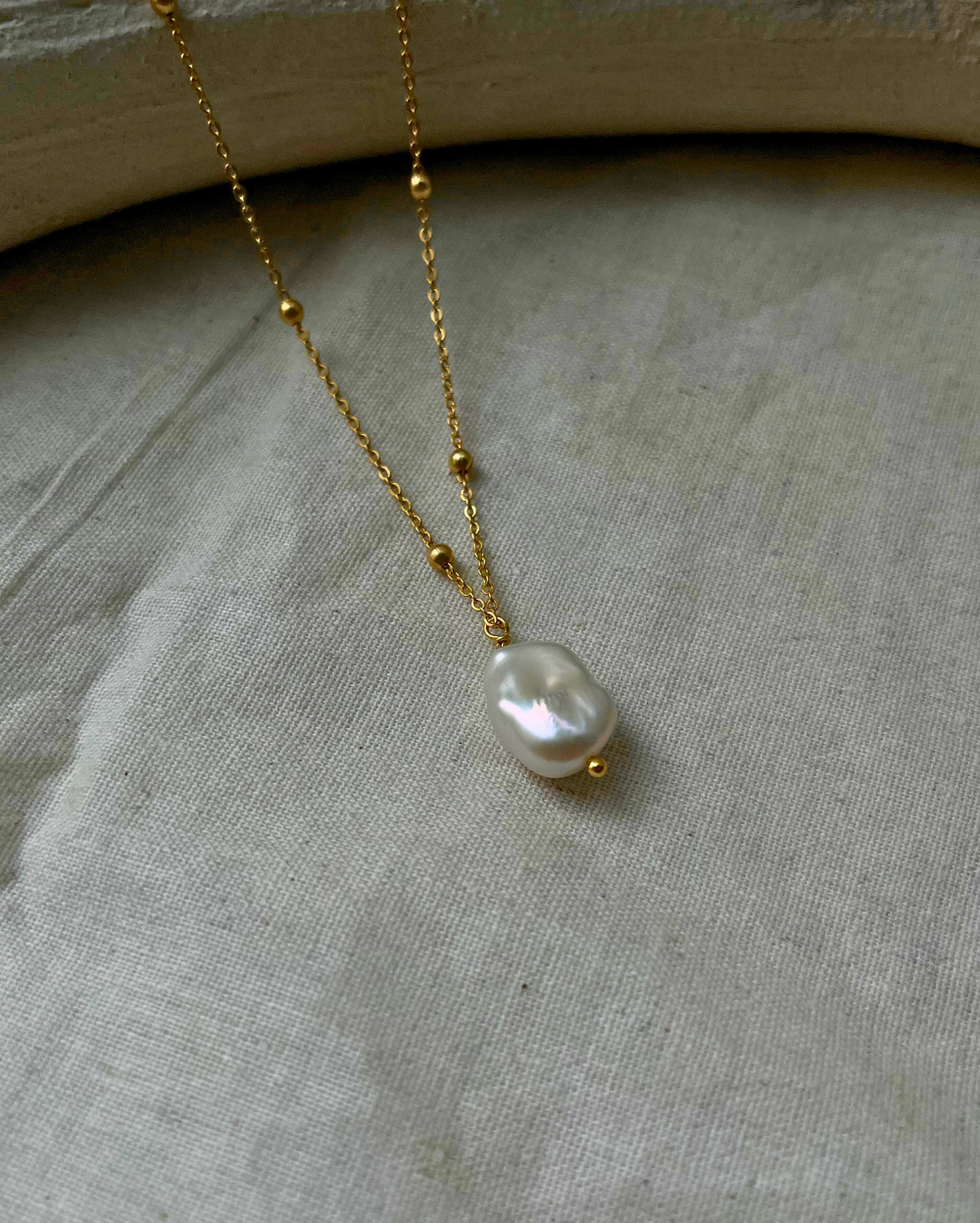 18k Gold dipped freshwater pearl necklace with a single freshwater pearl pendant  handmade by A Creator's Studio