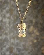 Brass box (dibbi) pendant with a labradorite in the centre with a chain handmade by A Creator's Studio