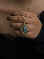 Brass box (dibbi) pendant with a large labradorite sitting in the centre with a chain handmade by A Creator's Studio