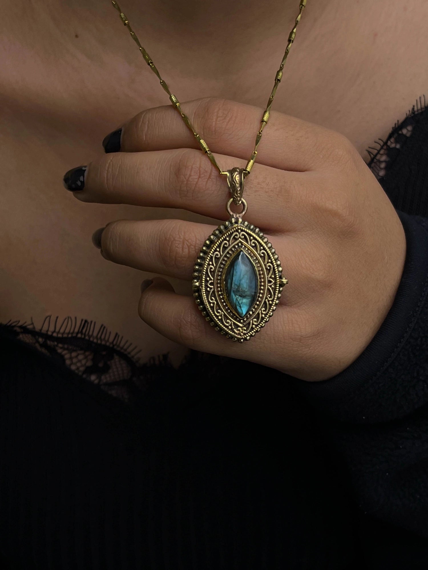Brass box (dibbi) pendant with a large labradorite sitting in the centre with a chain handmade by A Creator's Studio