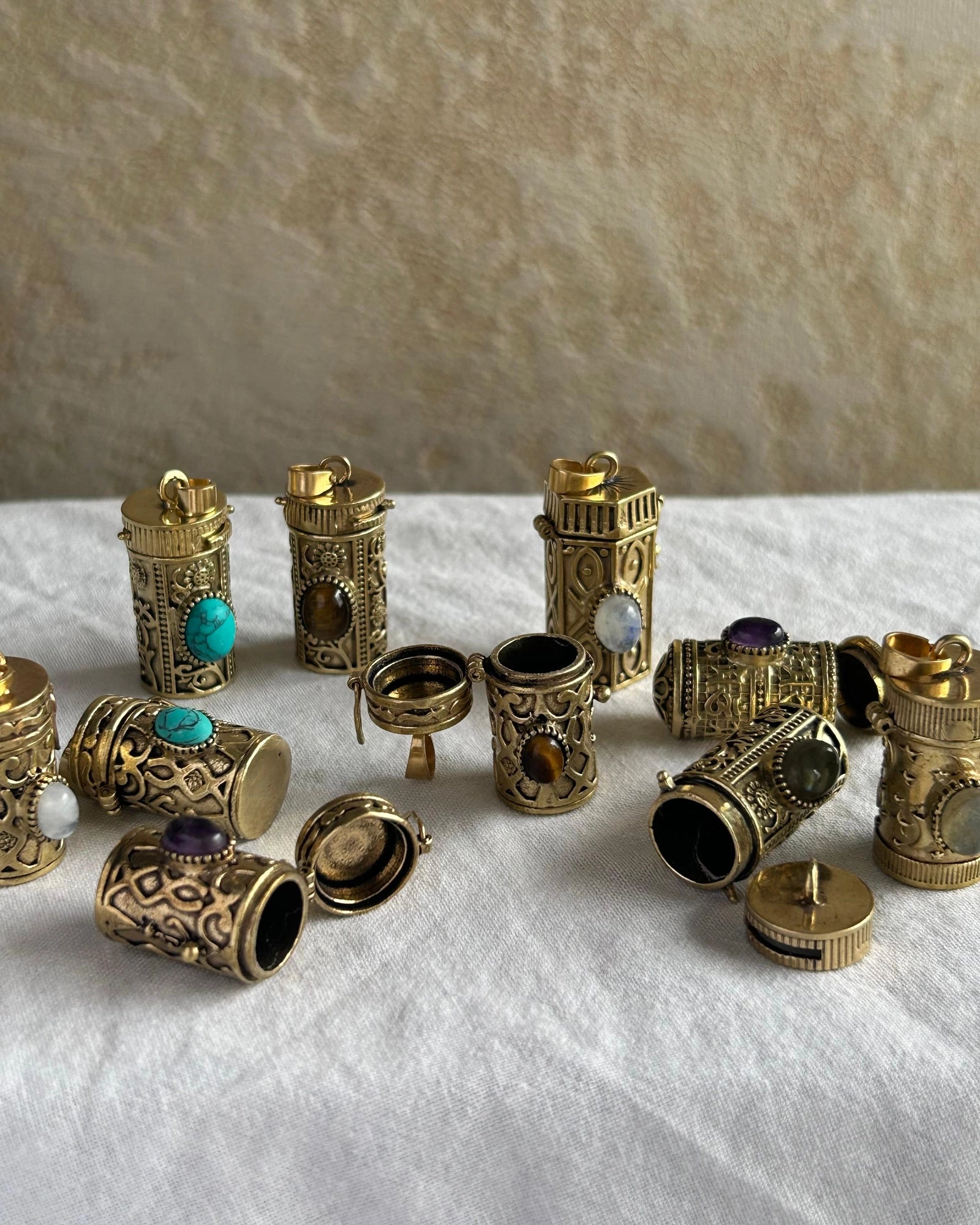 Brass box (dibbi) pendant with a turquoise in the centre with a chain handmade by A Creator's Studio