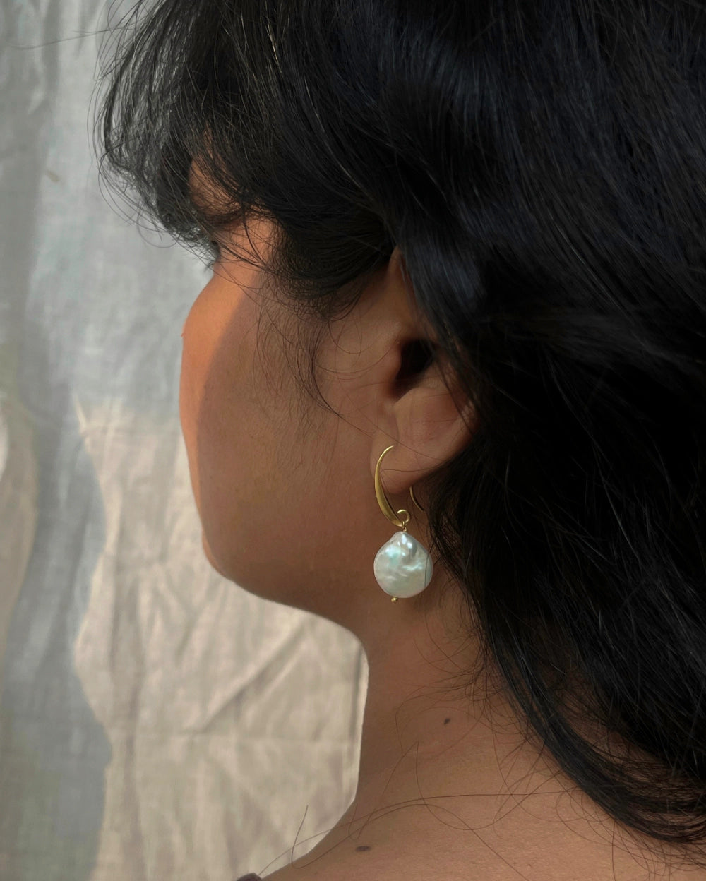 Gold plated freshwater pearl earrings with a freshwater pearl drop handmade by A Creator's Studio
