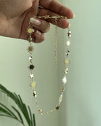 Brass star and sun link necklace with stars and suns linked together handmade by A Creator's Studio