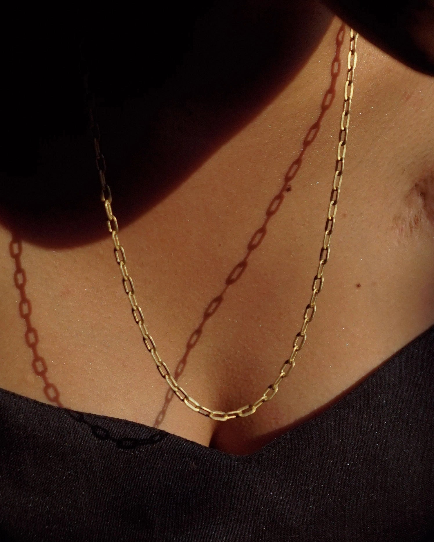 Brass rectangular link chain with flat links handmade by A Creator's Studio