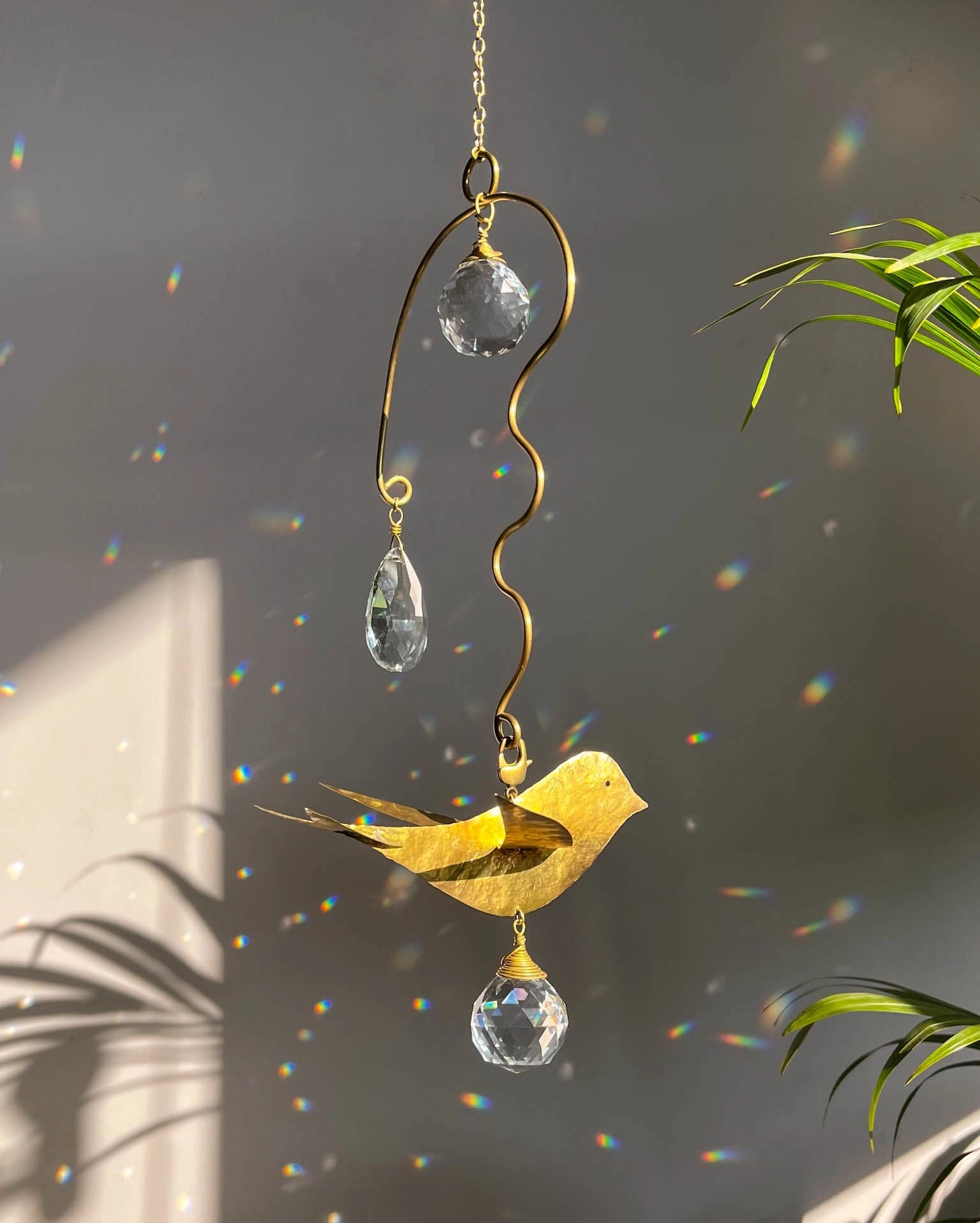 Brass wired bird suncatcher with clear crystals handmade by A Creator's Studio