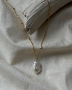 18k Gold dipped freshwater pearl necklace with a single freshwater pearl pendant  handmade by A Creator's Studio