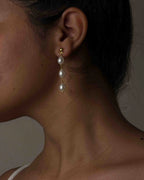 Gold Plated Pearl dangle earrings with three linked freshwater pearls handmade by A Creator's Studio