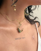 Brass wired crescent moon choker with emeralds and a chain handmade by A Creator's Studio