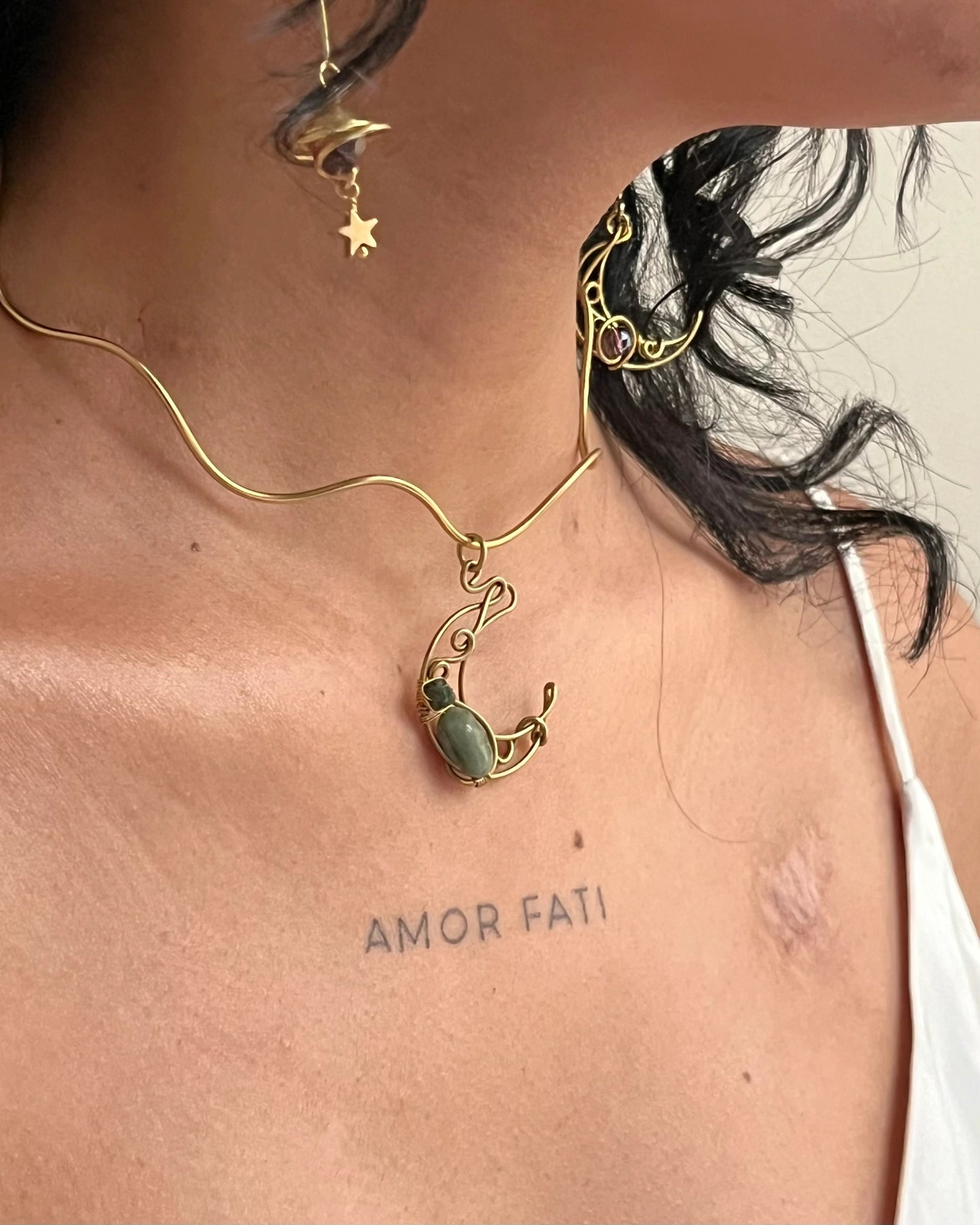 Brass wired crescent moon choker with emeralds and a chain handmade by A Creator's Studio