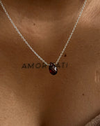 Dainty Silver Chain with a garnet drop pendant handmade by A Creator's Studio 