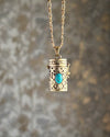 Brass box (dibbi) pendant with a turquoise in the centre with a chain handmade by A Creator's Studio