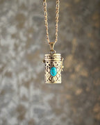 Brass box (dibbi) pendant with a turquoise in the centre with a chain handmade by A Creator's Studio