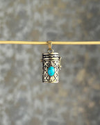Brass box (dibbi) pendant with a turquoise in the centre with a chain handmade by A Creator's Studio