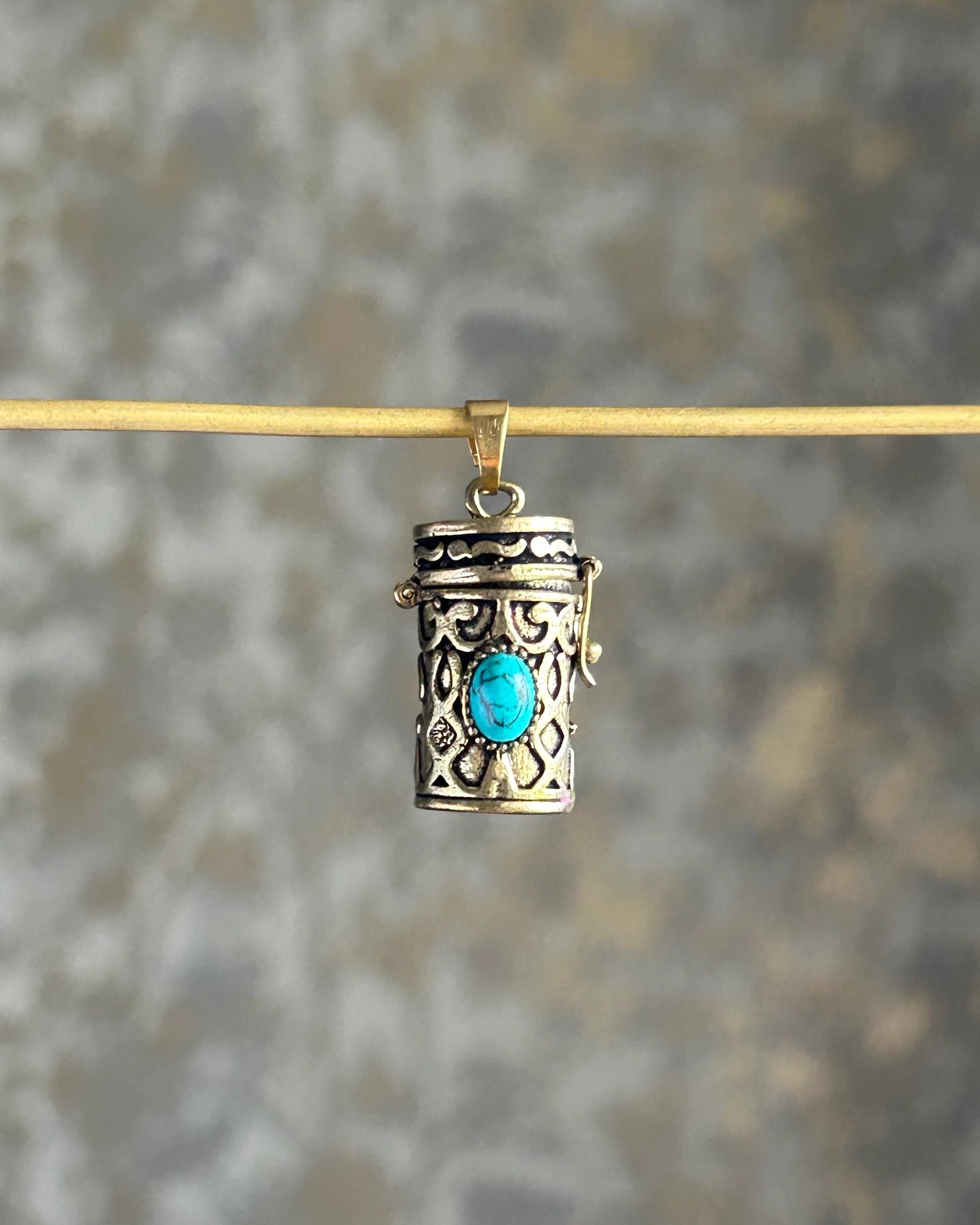 Brass box (dibbi) pendant with a turquoise in the centre with a chain handmade by A Creator's Studio