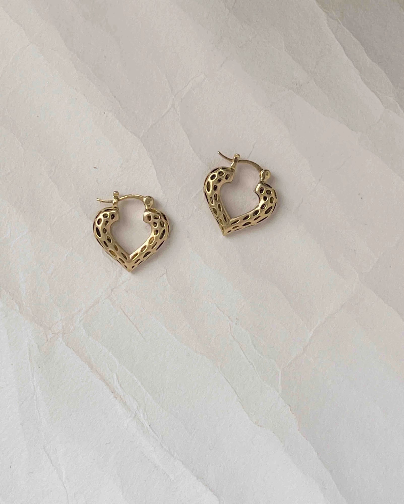 Brass heart hoop earrings handmade by A Creator's Studio