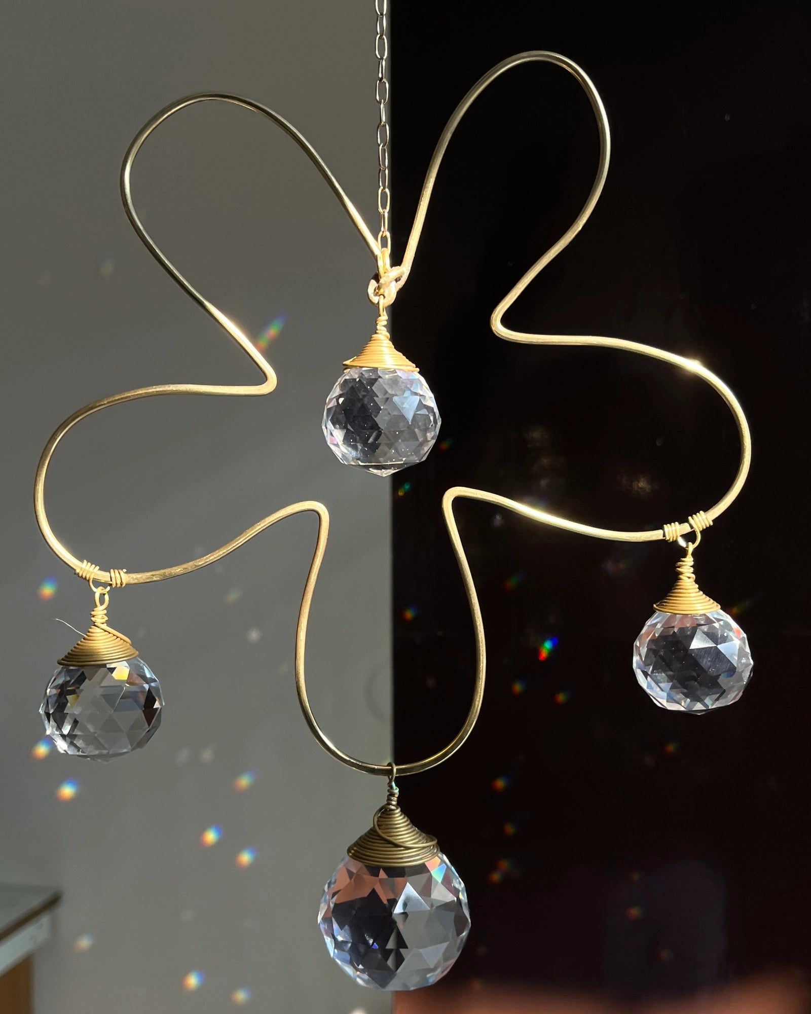 Wired flower suncatcher with clear crystals handmade by A Creator's Studio