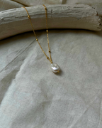 18k Gold dipped freshwater pearl necklace with a single freshwater pearl pendant  handmade by A Creator's Studio