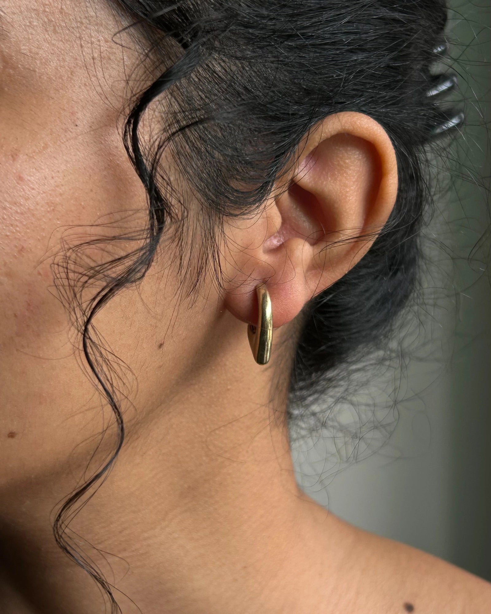 Brass dagger hoop earrings handmade by A Creator's Studio