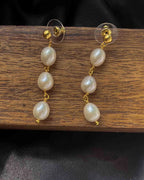 Gold Plated Pearl dangle earrings with three linked freshwater pearls handmade by A Creator's Studio
