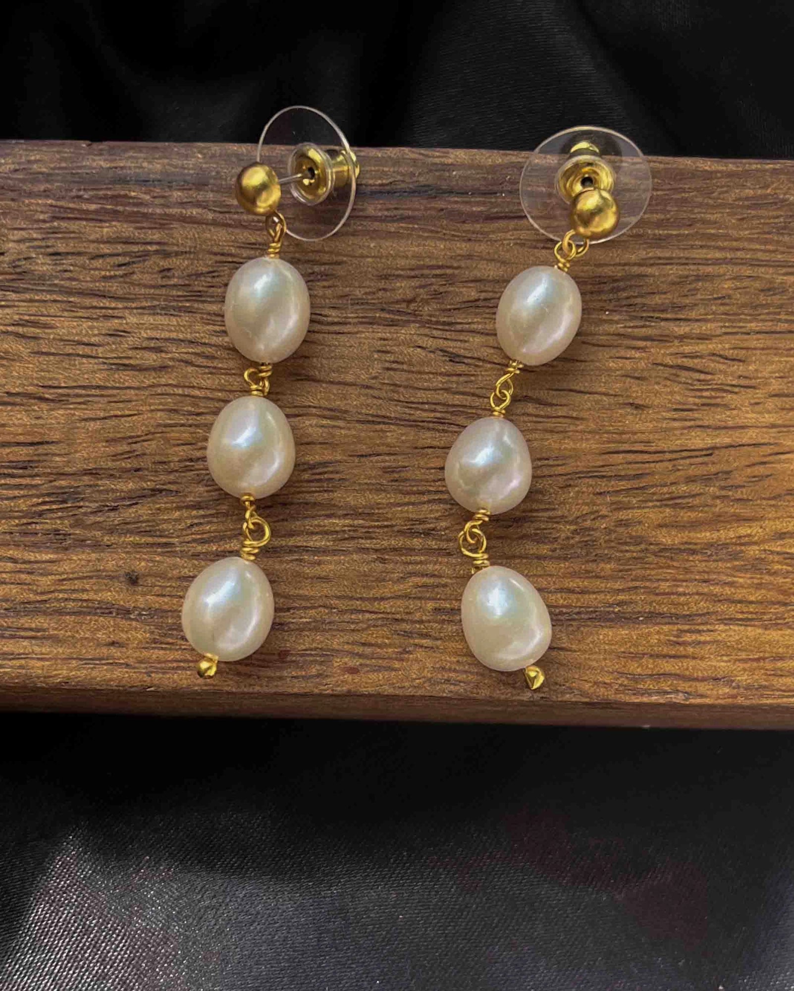 Gold Plated Pearl dangle earrings with three linked freshwater pearls handmade by A Creator's Studio