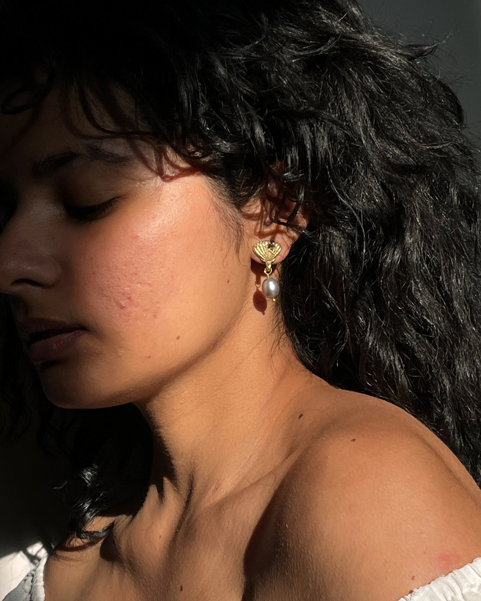 Gold Plated Seashell Pearl earrings with a grey fresh water pearl drop handmade by A Creator's Studio