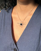 Sterling Silver Necklace with a wire wrapped sun pendant with a black onyx gemstone handmade by A Creator's Studio
