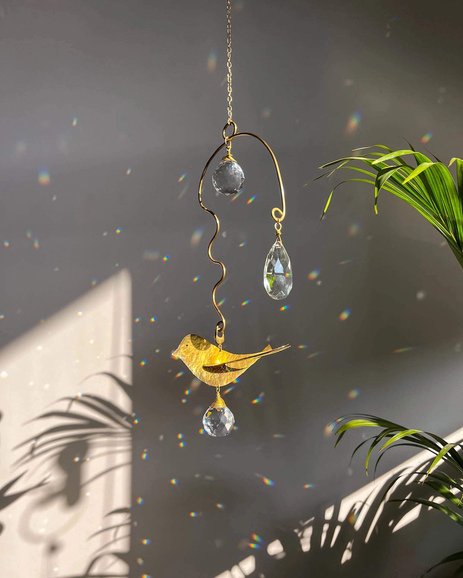 Brass wired bird suncatcher with clear crystals handmade by A Creator's Studio