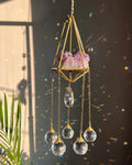 Amethyst Crystal sun catcher with an amethyst cluster in a 3d wired frame and glass crystal drops, handmade by A Creator's Studio