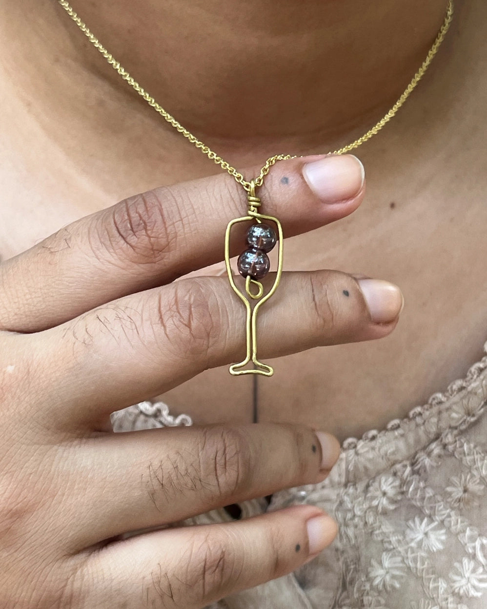 Brass wired wine glass necklace with two crystals handmade by A Creator's Studio