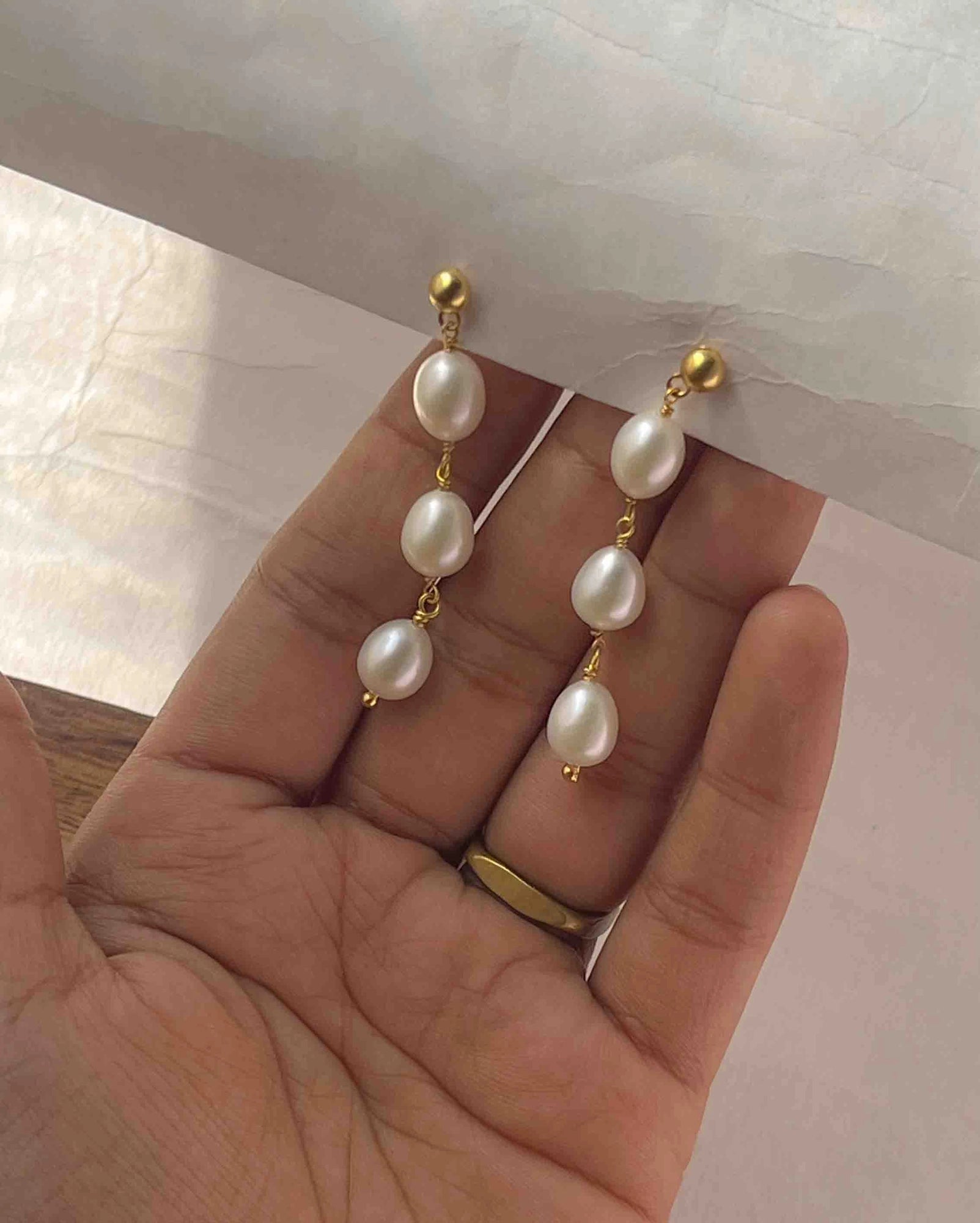Gold Plated Pearl dangle earrings with three linked freshwater pearls handmade by A Creator's Studio