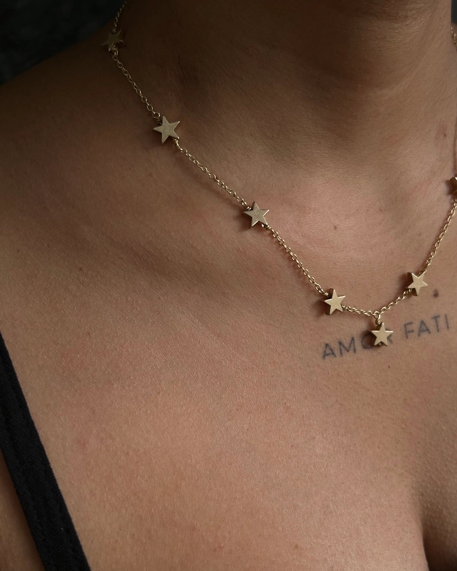 Brass star link choker with stars linked together handmade by A Creator's Studio