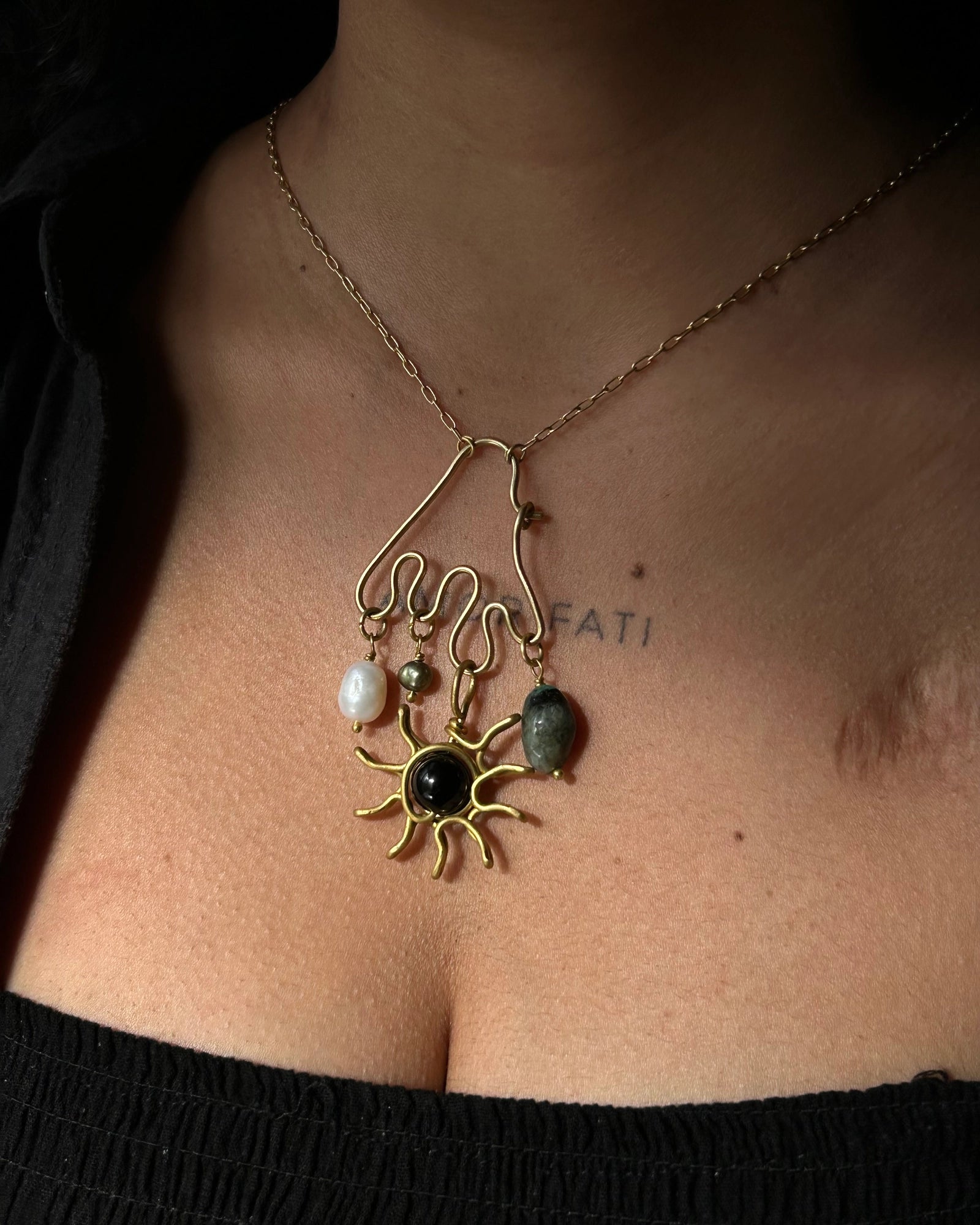 Brass wired charm holder necklace with a chain handmade by A Creator's Studio