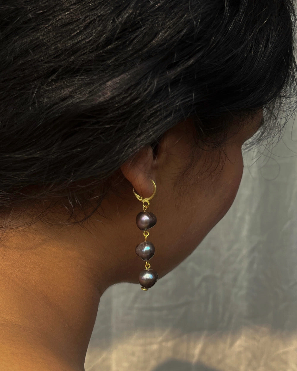 gold plated Classic black pearl dangle earrings with three lustrous black freshwater pearls handmade by A Creator's Studio