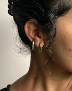 Brass dagger hoop earrings handmade by A Creator's Studio