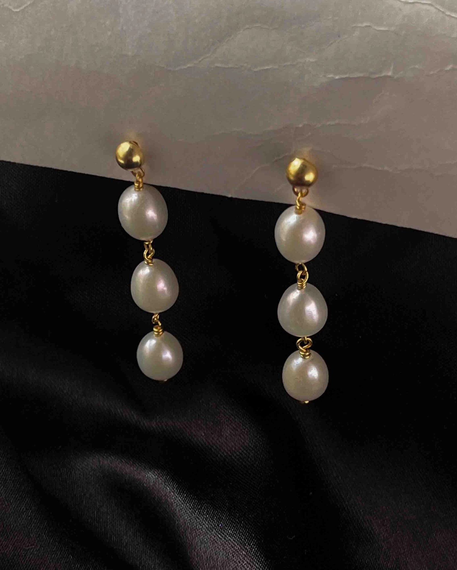 Gold Plated Pearl dangle earrings with three linked freshwater pearls handmade by A Creator's Studio