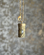 Brass box (dibbi) pendant with a labradorite in the centre with a chain handmade by A Creator's Studio