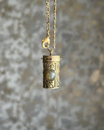 Brass box (dibbi) pendant with a labradorite in the centre with a chain handmade by A Creator's Studio