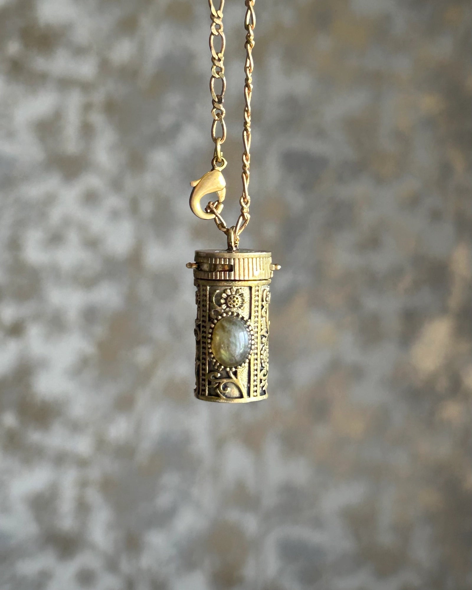 Brass box (dibbi) pendant with a labradorite in the centre with a chain handmade by A Creator's Studio
