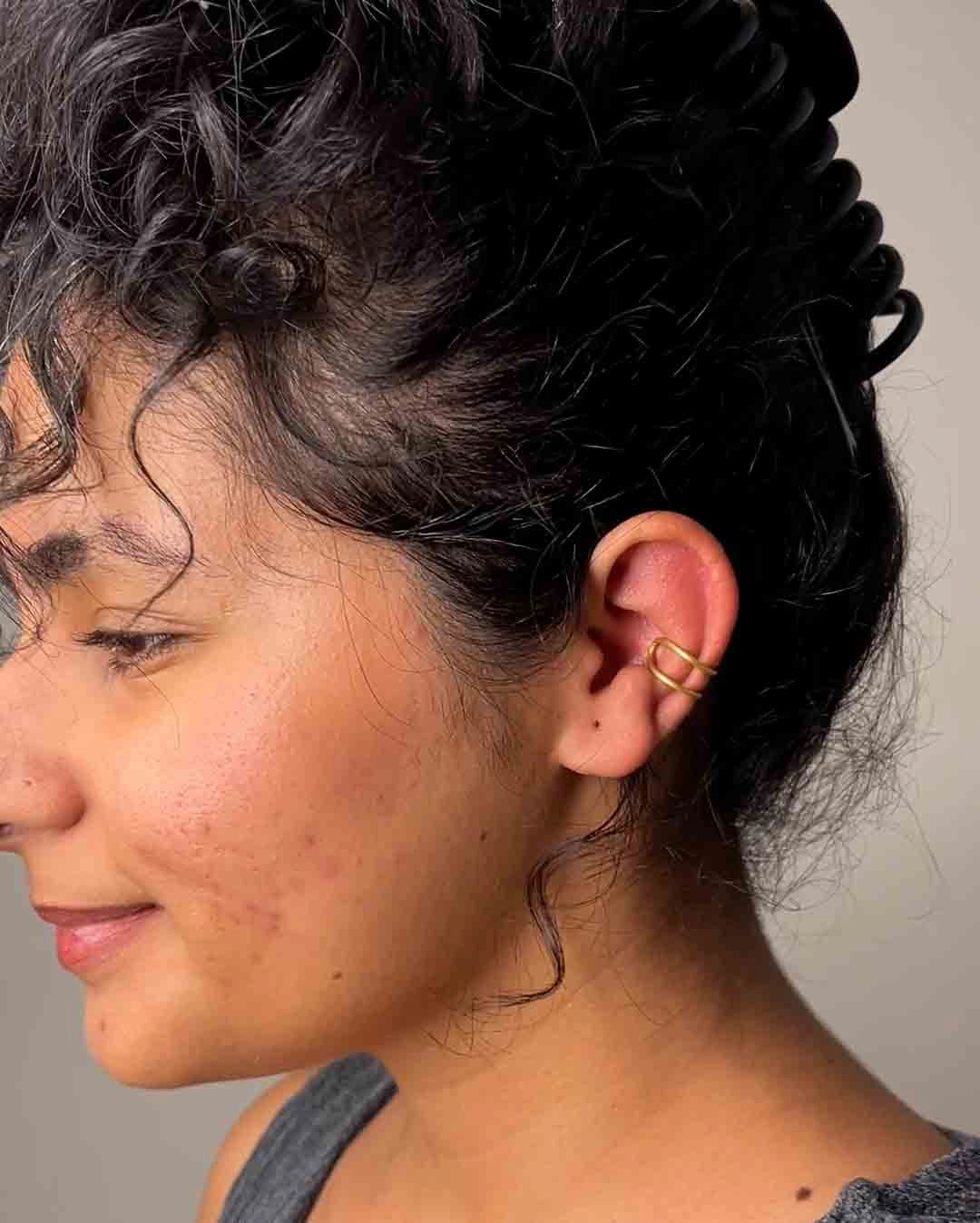 Brass double piercing ear cuff handmade by A Creator's Studio