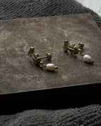 Brass Earrings with unique fish design and  pearl handmade by a creator's studio