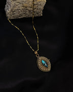 Brass box (dibbi) pendant with a large labradorite sitting in the centre with a chain handmade by A Creator's Studio