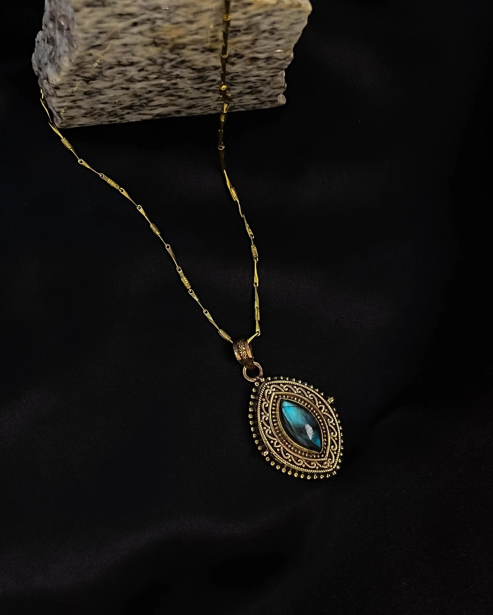 Brass box (dibbi) pendant with a large labradorite sitting in the centre with a chain handmade by A Creator's Studio