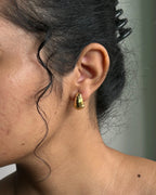 Brass textured hoop earrings handmade by A Creator's Studio